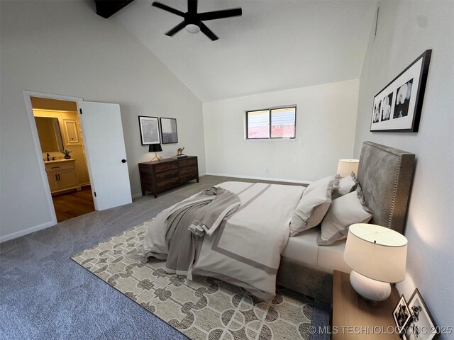 4760 S Irvington Ave, Tulsa, OK 74135 - carpeted bedroom with ceiling fan, ensuite bath, baseboards, and high vaulted ceiling