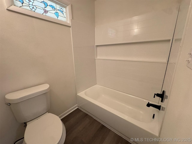 4760 S Irvington Ave, Tulsa, OK 74135 - bathroom featuring toilet, wood finished floors, and baseboards