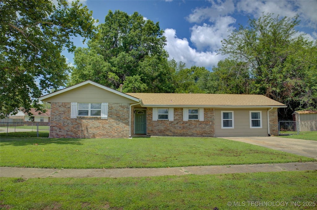 46 S 188th E Ave, Tulsa, OK 74108 - single story home featuring brick siding, a front lawn, and fence