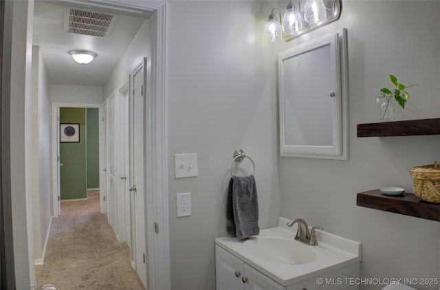 46 S 188th E Ave, Tulsa, OK 74108 - bathroom featuring visible vents and vanity