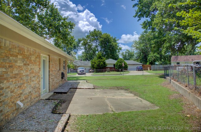 46 S 188th E Ave, Tulsa, OK 74108 - view of yard featuring a patio area and fence