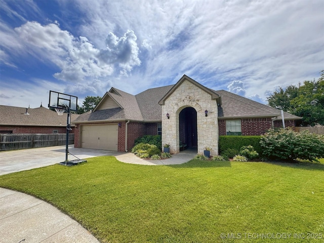 661 Kingston Pl, Tahlequah, OK 74464 - view of front of property with driveway, brick siding, an attached garage, roof with shingles, and stone siding
