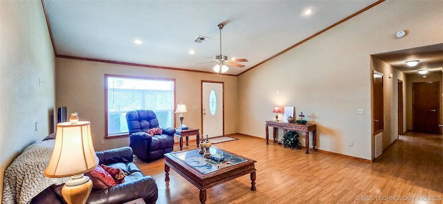 living room with visible vents, light wood-style floors, a ceiling fan, and vaulted ceiling