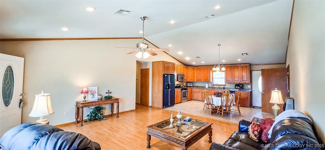 living room with visible vents, a ceiling fan, baseboards, light wood-style floors, and lofted ceiling