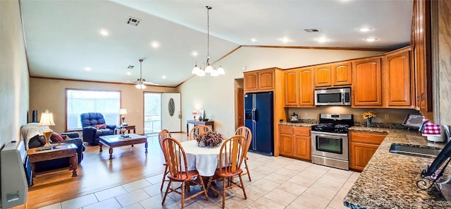 kitchen featuring open floor plan, visible vents, appliances with stainless steel finishes, and brown cabinets