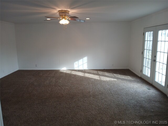 carpeted empty room with crown molding, french doors, a ceiling fan, visible vents, and recessed lighting