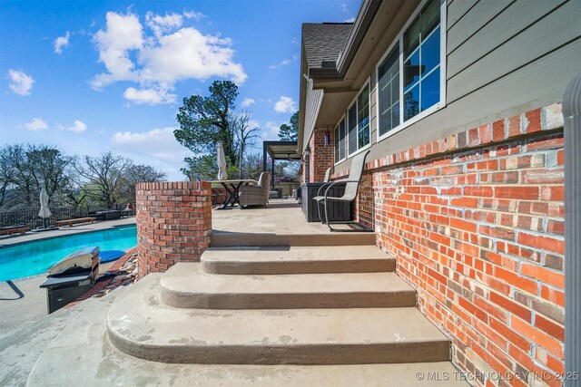 122 Osage Ridge Dr, Sand Springs, OK 74063 - exterior space featuring a fenced in pool and outdoor dining space