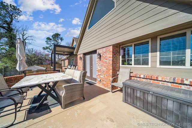 122 Osage Ridge Dr, Sand Springs, OK 74063 - view of patio with french doors, outdoor dining area, and fence