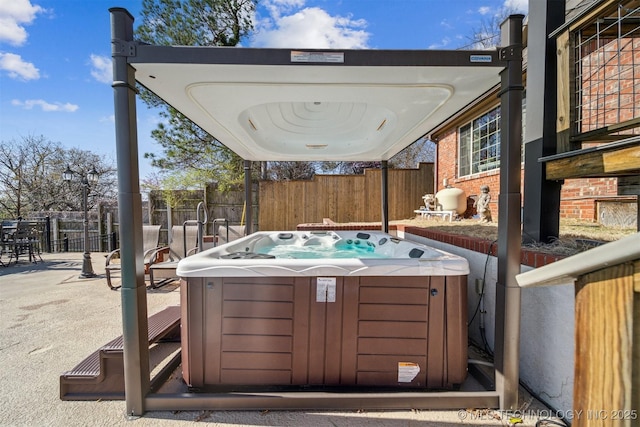 122 Osage Ridge Dr, Sand Springs, OK 74063 - view of patio with a hot tub and fence