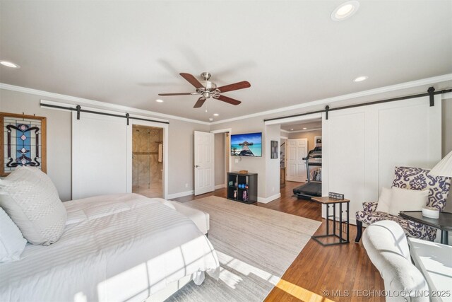 122 Osage Ridge Dr, Sand Springs, OK 74063 - bedroom featuring recessed lighting, a barn door, wood finished floors, and crown molding