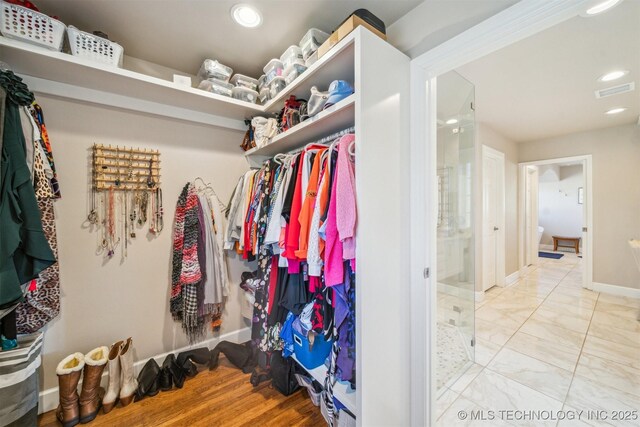 122 Osage Ridge Dr, Sand Springs, OK 74063 - spacious closet with visible vents and marble finish floor