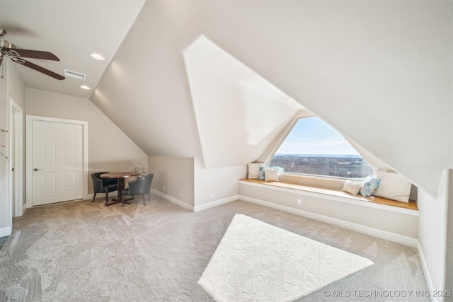 122 Osage Ridge Dr, Sand Springs, OK 74063 - additional living space with visible vents, baseboards, lofted ceiling, carpet floors, and a ceiling fan