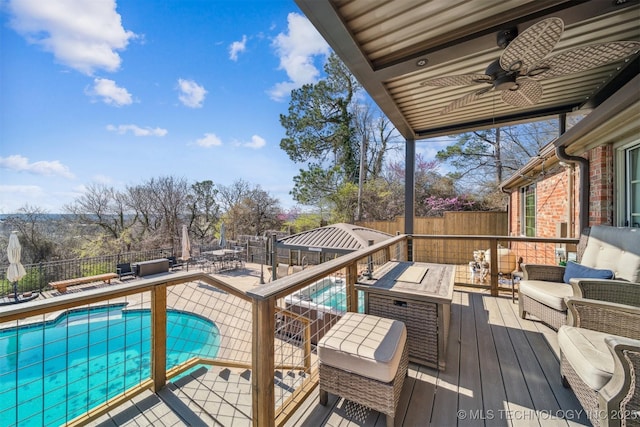 122 Osage Ridge Dr, Sand Springs, OK 74063 - wooden deck featuring a fenced in pool, an outdoor hangout area, a ceiling fan, and a fenced backyard