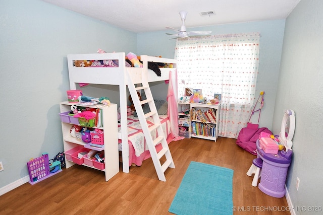 1004 S Owens Ave, Tahlequah, OK 74464 - bedroom featuring wood finished floors, baseboards, and ceiling fan
