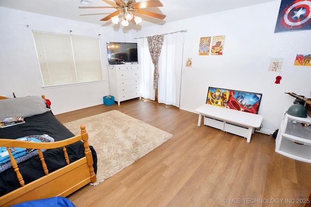 1004 S Owens Ave, Tahlequah, OK 74464 - living room featuring wood finished floors and a ceiling fan