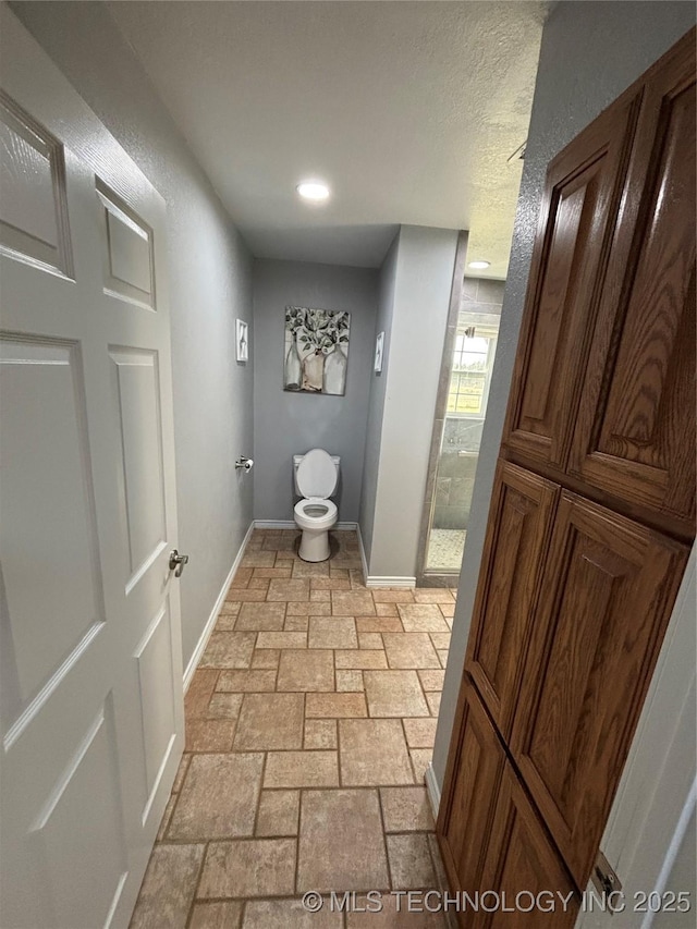 34 S Mount Calvary Rd, Hendrix, OK 74741 - full bath with toilet, baseboards, a shower stall, stone tile floors, and recessed lighting