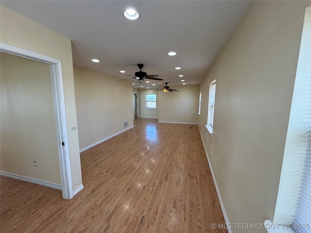 34 S Mount Calvary Rd, Hendrix, OK 74741 - unfurnished room featuring a ceiling fan, baseboards, recessed lighting, and light wood-style floors