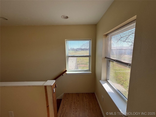 34 S Mount Calvary Rd, Hendrix, OK 74741 - staircase featuring plenty of natural light, wood finished floors, and baseboards