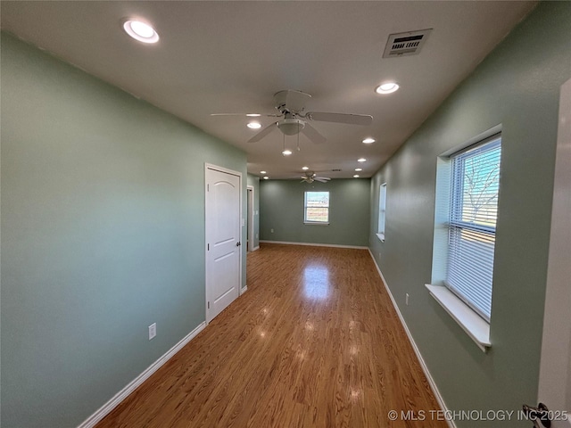 34 S Mount Calvary Rd, Hendrix, OK 74741 - spare room featuring wood finished floors, ceiling fan, baseboards, and recessed lighting