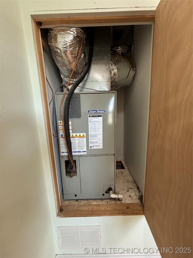 34 S Mount Calvary Rd, Hendrix, OK 74741 - utility room featuring heating unit