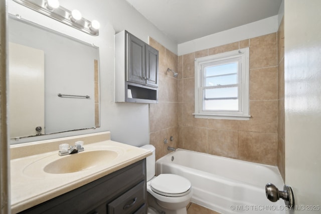 7380 E Independence St, Tulsa, OK 74115 - full bathroom featuring shower / bath combination, toilet, and vanity