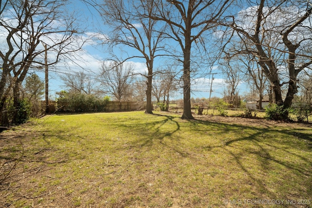 7380 E Independence St, Tulsa, OK 74115 - view of yard with fence