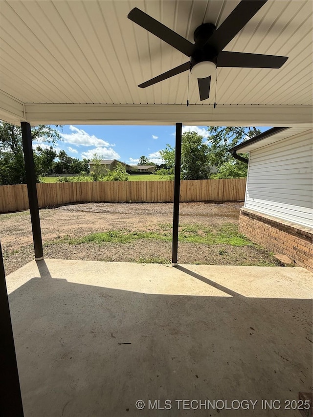 1103 S Chickasaw Pl, Claremore, OK 74017 - view of patio featuring fence and a ceiling fan