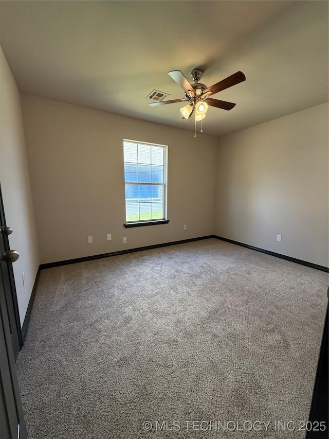 1103 S Chickasaw Pl, Claremore, OK 74017 - spare room featuring visible vents, baseboards, ceiling fan, and carpet floors