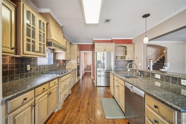 11727 S 91st E Ave, Bixby, OK 74008 - kitchen with appliances with stainless steel finishes, a sink, open shelves, arched walkways, and dark wood finished floors