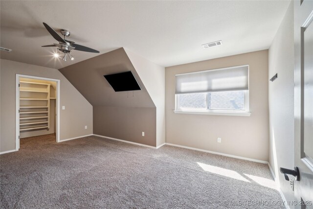 11727 S 91st E Ave, Bixby, OK 74008 - bonus room with a ceiling fan, carpet, baseboards, and vaulted ceiling