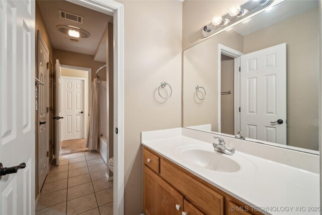 11727 S 91st E Ave, Bixby, OK 74008 - full bath featuring vanity, tile patterned flooring, shower / tub combo, and toilet