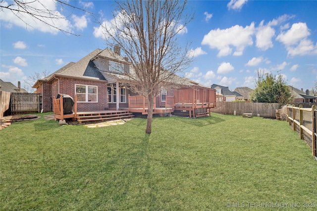 11727 S 91st E Ave, Bixby, OK 74008 - rear view of house featuring a wooden deck, brick siding, a chimney, and roof with shingles