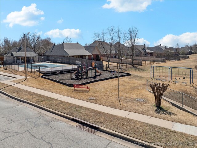 11727 S 91st E Ave, Bixby, OK 74008 - communal playground with a community pool and a residential view