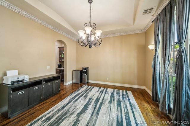 10848 S 95th E Ave, Tulsa, OK 74133 - unfurnished dining area featuring visible vents, dark wood-style floors, arched walkways, vaulted ceiling, and a notable chandelier