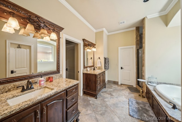 10848 S 95th E Ave, Tulsa, OK 74133 - bathroom featuring two vanities, a bath, ornamental molding, and a sink