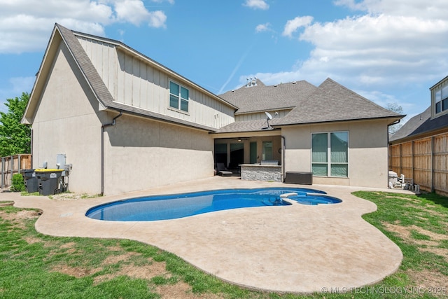 10848 S 95th E Ave, Tulsa, OK 74133 - rear view of property featuring a fenced backyard, stucco siding, ceiling fan, a shingled roof, and a patio