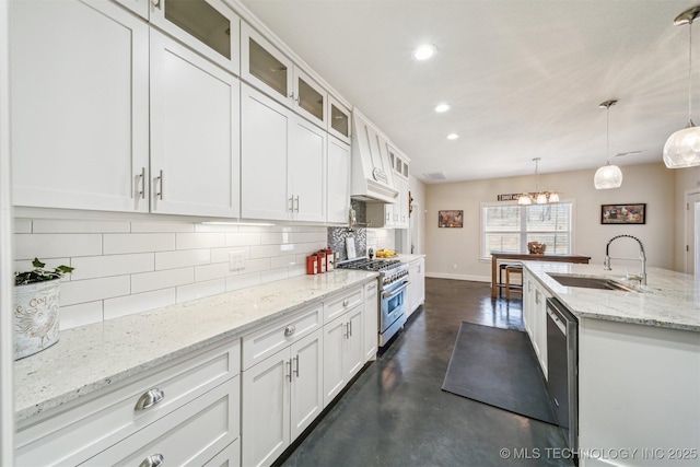 11210 W 178th St, Skiatook, OK 74070 - kitchen featuring stainless steel appliances, a sink, finished concrete flooring, decorative backsplash, and baseboards