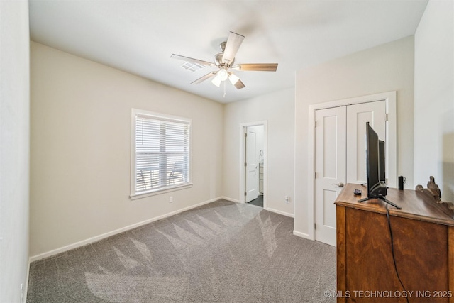 11210 W 178th St, Skiatook, OK 74070 - carpeted bedroom featuring baseboards, a ceiling fan, ensuite bath, and a closet
