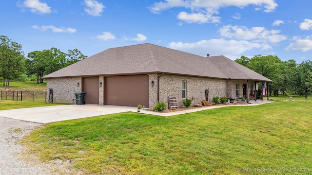11210 W 178th St, Skiatook, OK 74070 - view of home's exterior with a garage, driveway, brick siding, and roof with shingles
