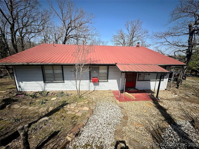 view of front of home featuring metal roof