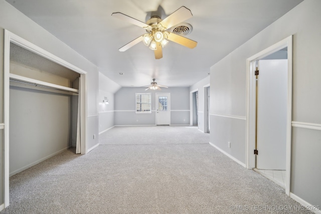 6924 S Knoxville Ave, Tulsa, OK 74136 - unfurnished bedroom with carpet flooring, ceiling fan, and a closet