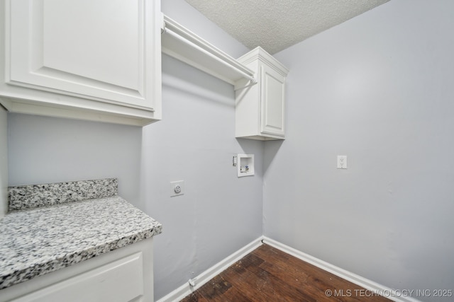 6924 S Knoxville Ave, Tulsa, OK 74136 - laundry area featuring cabinet space, dark wood-style flooring, washer hookup, a textured ceiling, and electric dryer hookup