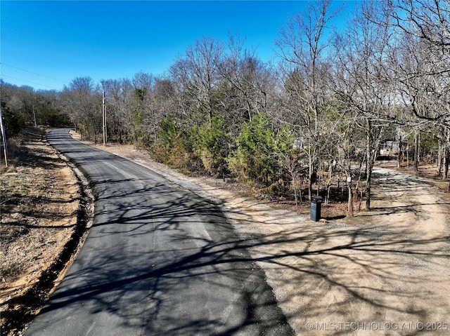 117700 S 4214th Rd, Eufaula, OK 74432 - view of asphalt street featuring a wooded view