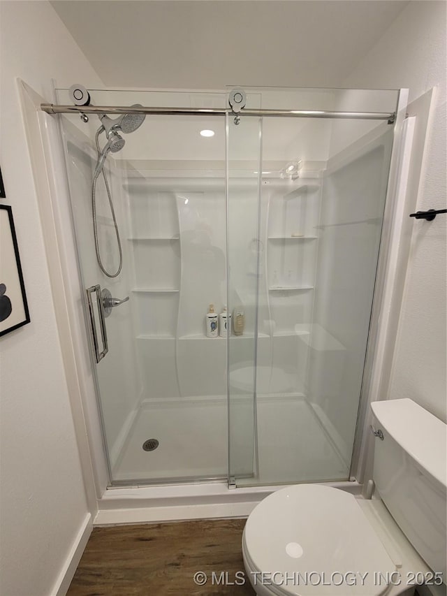 117700 S 4214th Rd, Eufaula, OK 74432 - bathroom with toilet, a shower stall, and wood finished floors