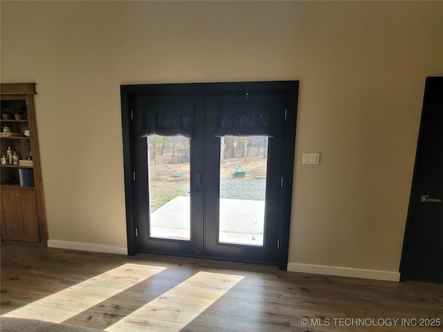 117700 S 4214th Rd, Eufaula, OK 74432 - entryway featuring french doors, wood finished floors, baseboards, and healthy amount of natural light