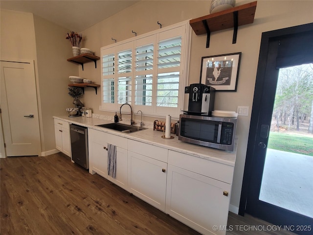 117700 S 4214th Rd, Eufaula, OK 74432 - kitchen with stainless steel appliances, a sink, open shelves, dark wood-type flooring, and white cabinets