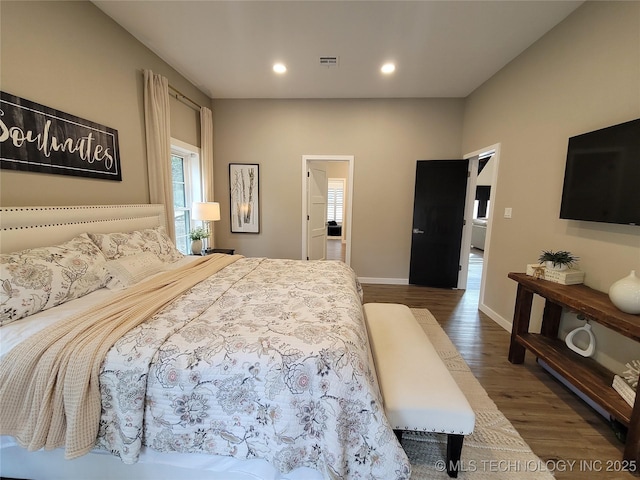 117700 S 4214th Rd, Eufaula, OK 74432 - bedroom with multiple windows, wood finished floors, recessed lighting, and baseboards