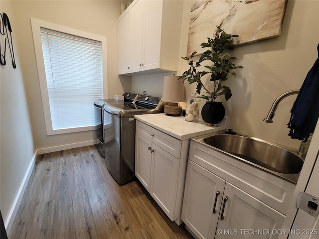 117700 S 4214th Rd, Eufaula, OK 74432 - laundry room with separate washer and dryer, cabinet space, dark wood-style floors, and baseboards