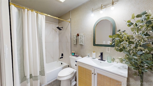 bathroom with toilet, vanity, and shower / bath combo