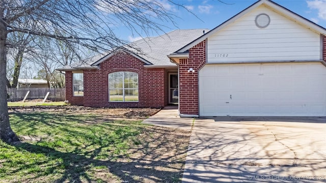 single story home with concrete driveway, roof with shingles, fence, an attached garage, and brick siding